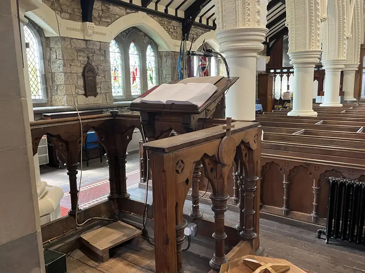 Wooden eagle lectern beside the nave