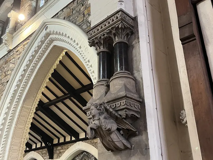 Angel corbel and clustered arch detail