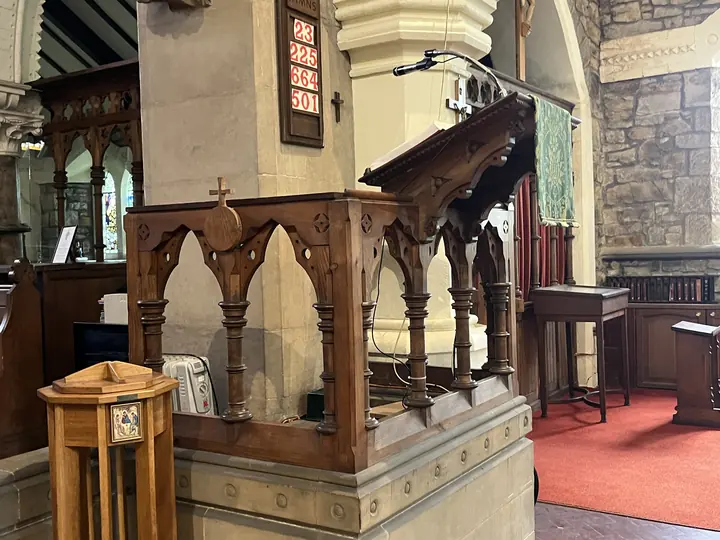 Wooden lectern and carved stone pulpit